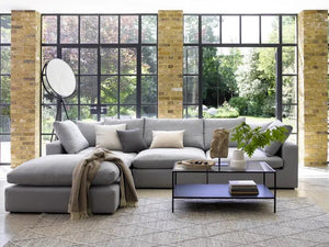 Long Island Modular Sofa set in spacious living room with customizable configuration and feather cushions