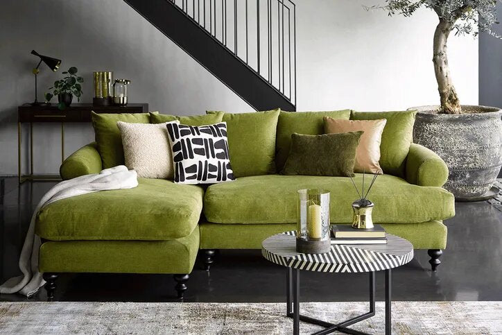 Teddy Chaise Lounge with deep seating and sculpted scroll arms in neutral fabric