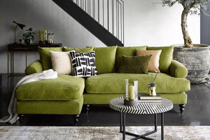 Teddy Chaise Lounge with deep seating, scroll arms, feather cushions, and beech wood frame in fabric upholstery