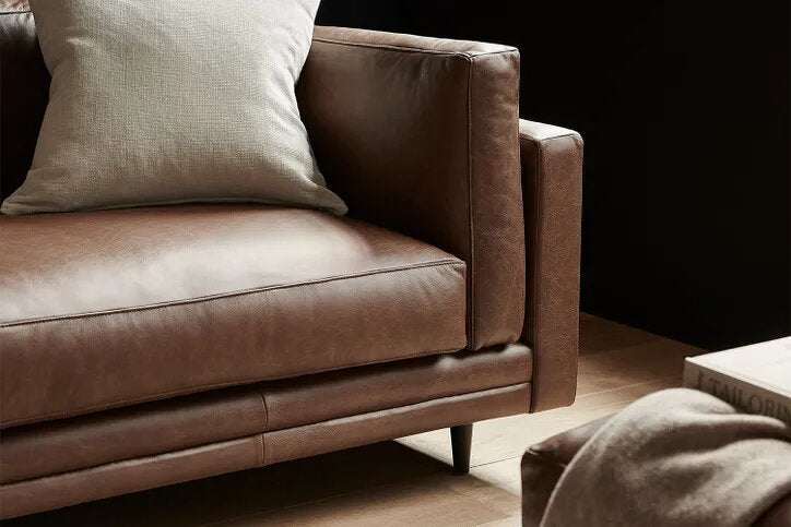 Marco Contemporary 3 Seater Sofa with streamlined silhouette and stitched cushions in a modern living room setting