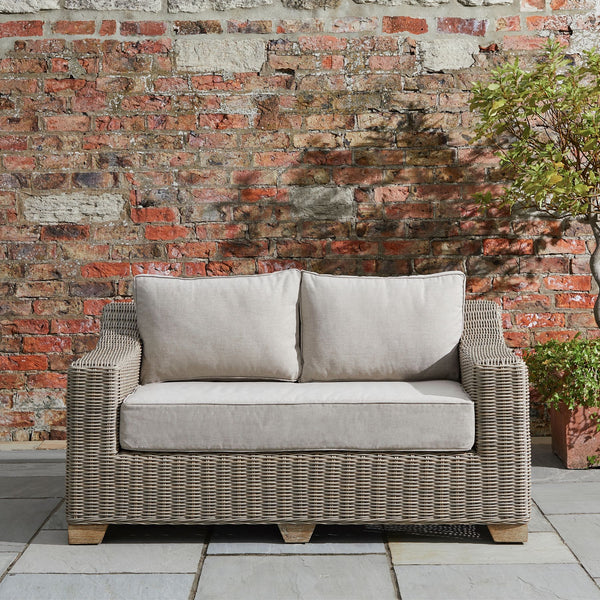 Capri Collection Outdoor 2-Seater Sofa with Cushions, Weather-Resistant HDPE Wicker & Aluminum Frame