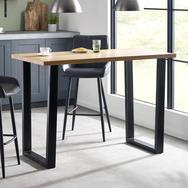 Julian Bowen Brooklyn Solid Oak Industrial Bar Table with Metal Trapeze Legs – Rustic Wooden Breakfast & Pub Table