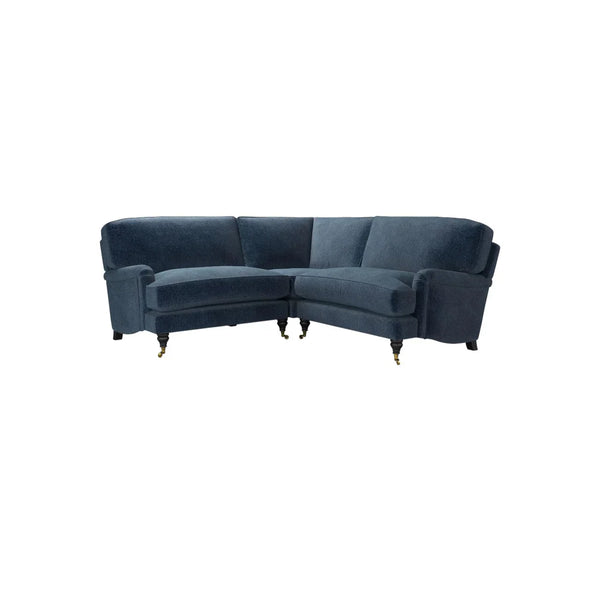 Bluebell Classic Chaise Sofa UK with wooden legs and feather cushions in traditional living room setting