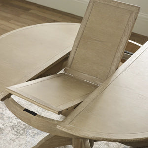 Julian Bowen Camille Round Extending Dining Table in Limed Oak – 110-145cm Extendable Pedestal Dining Table