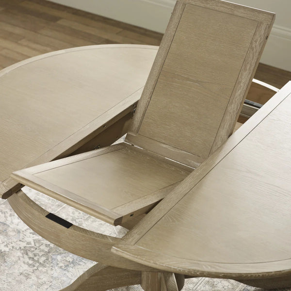 Julian Bowen Camille Round Extending Dining Table in Limed Oak – 110-145cm Extendable Pedestal Dining Table