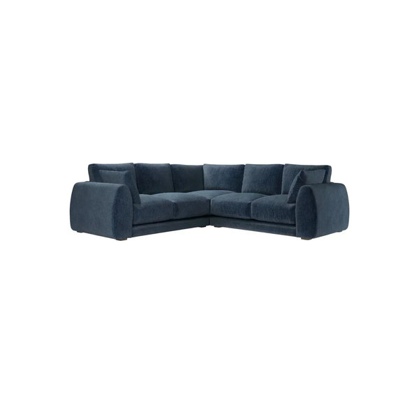 Bluebell Classic Chaise Sofa UK with wooden legs and fabric cushions in traditional living room setting