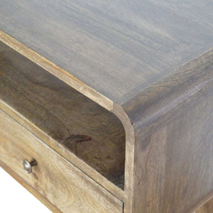 Curved grey console table with open storage slot