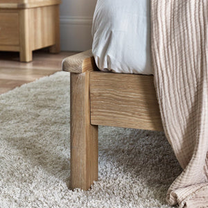 Memphis Limed Oak Wooden Bed Frame with Curved Panelled Headboard