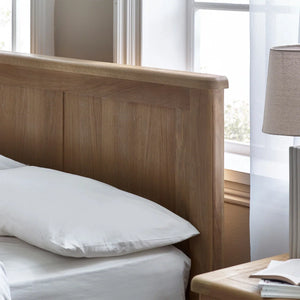 Memphis Limed Oak Wooden Bed Frame with Curved Panelled Headboard
