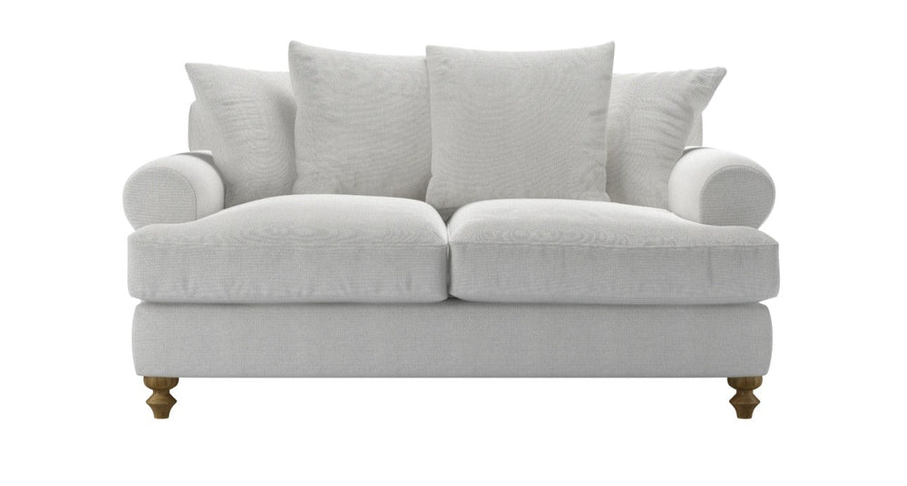 Teddy Sofa Bed upholstered in soft teddy fabric with deep seats and feather cushions in a cozy living room setting