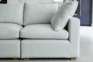 Long Island Slims Modular Sofa in olive green fabric with customizable arrangement in modern living room