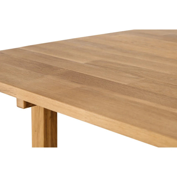 Coxmoor Solid Oak Extending Dining Table with Integrated Leaf Extension – Oiled Finish - Sleek Furniture