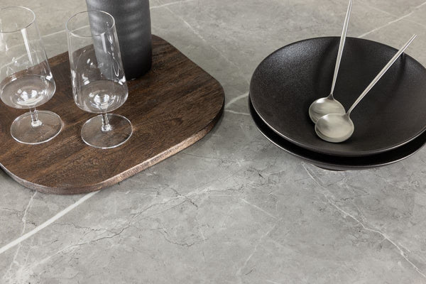 Härön Round Dining Table – Ribbed Dark Brown Base with Stone Top