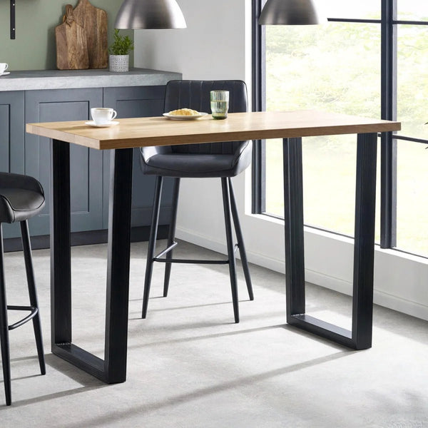 Julian Bowen Brooklyn Solid Oak Industrial Bar Table with Metal Trapeze Legs – Rustic Wooden Breakfast & Pub Table - Sleek Furniture