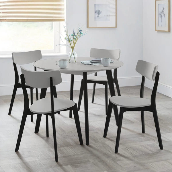 Julian Bowen round dining table with modern retro design