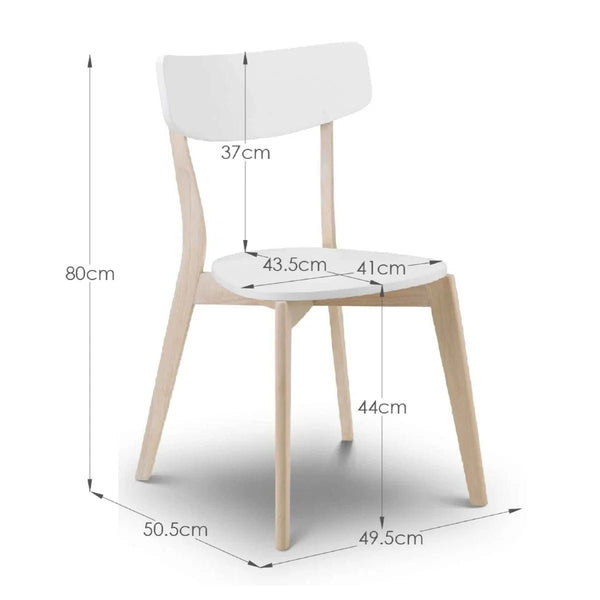 Pair of white Casa dining chairs for a modern dining area