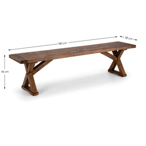 Reclaimed wood dining table showing detailed trestle legs