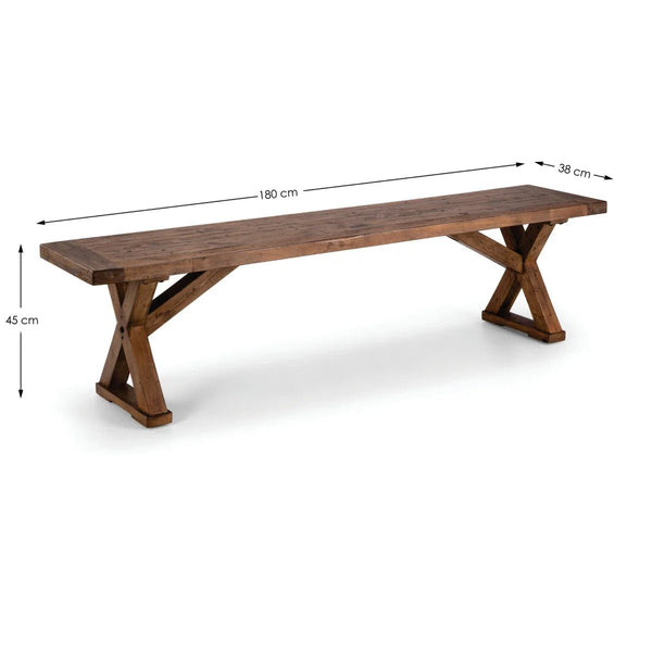 Reclaimed wood dining table showing detailed trestle legs