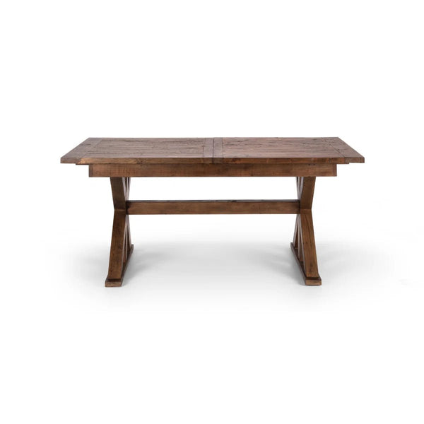 Reclaimed wood dining table showing detailed trestle legs