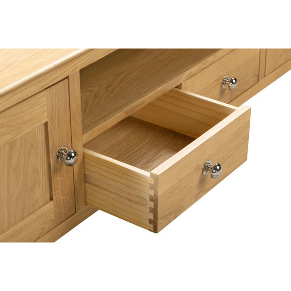 Julian Bowen Cotswold Solid Oak Widescreen TV Unit with 2 Drawers, 2 Cupboards & Open Shelf – Oak Entertainment Stand for TVs up to 65 Inch - Sleek Furniture