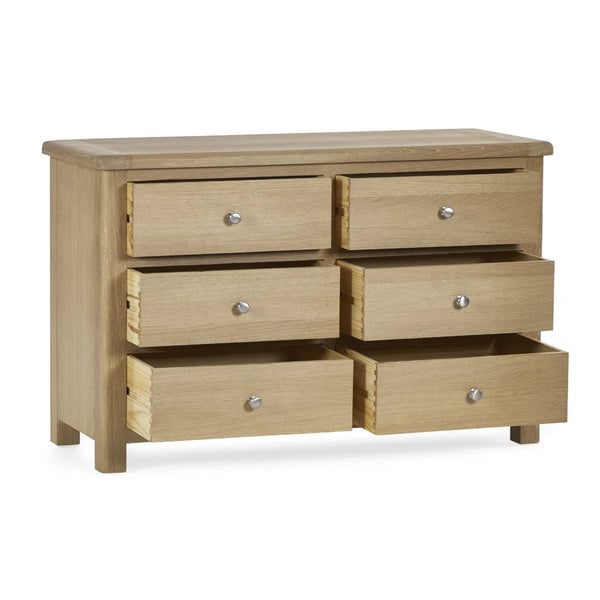 Memphis Limed Oak 6 Drawer Wide Chest of Drawers with Interchangeable Silver Handles - Sleek Furniture