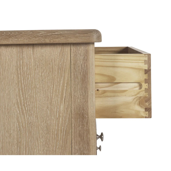 Memphis Limed Oak 6 Drawer Wide Chest of Drawers with Interchangeable Silver Handles - Sleek Furniture